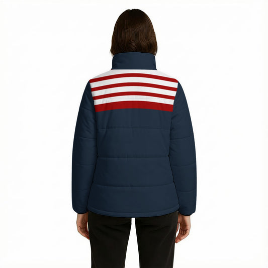 Retro 80s navy blue puffer jacket with nautical red and white stripe detail and cotton insulation. Vintage unisex winter jacket by Trendy Hip Buys.