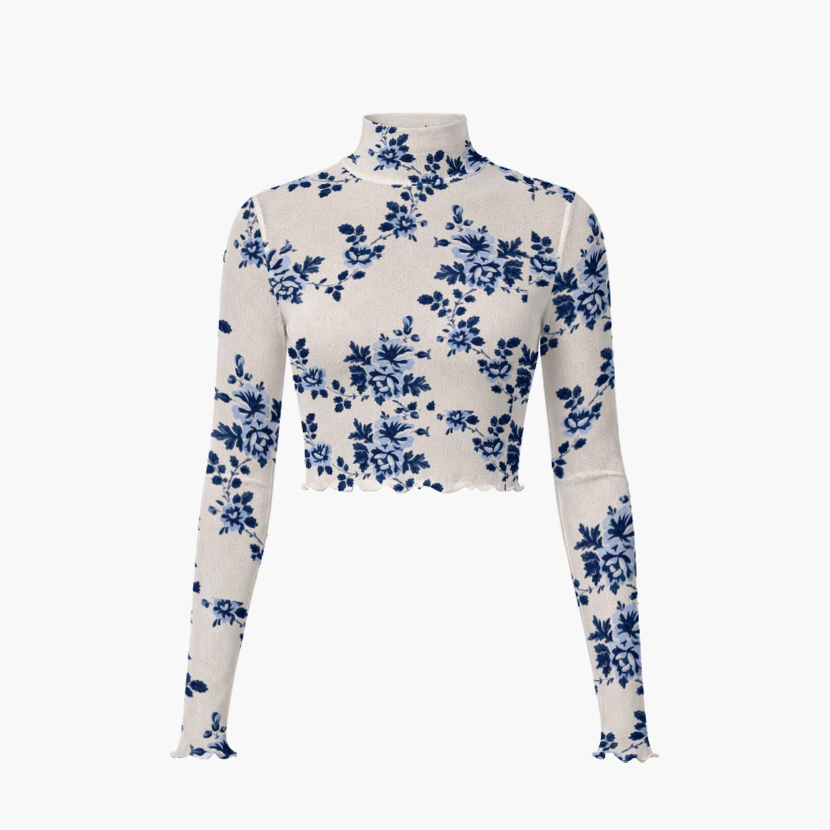 A long-sleeve mock neck crop top featuring a blue floral pattern on a cream-colored base, displayed against a solid white background.