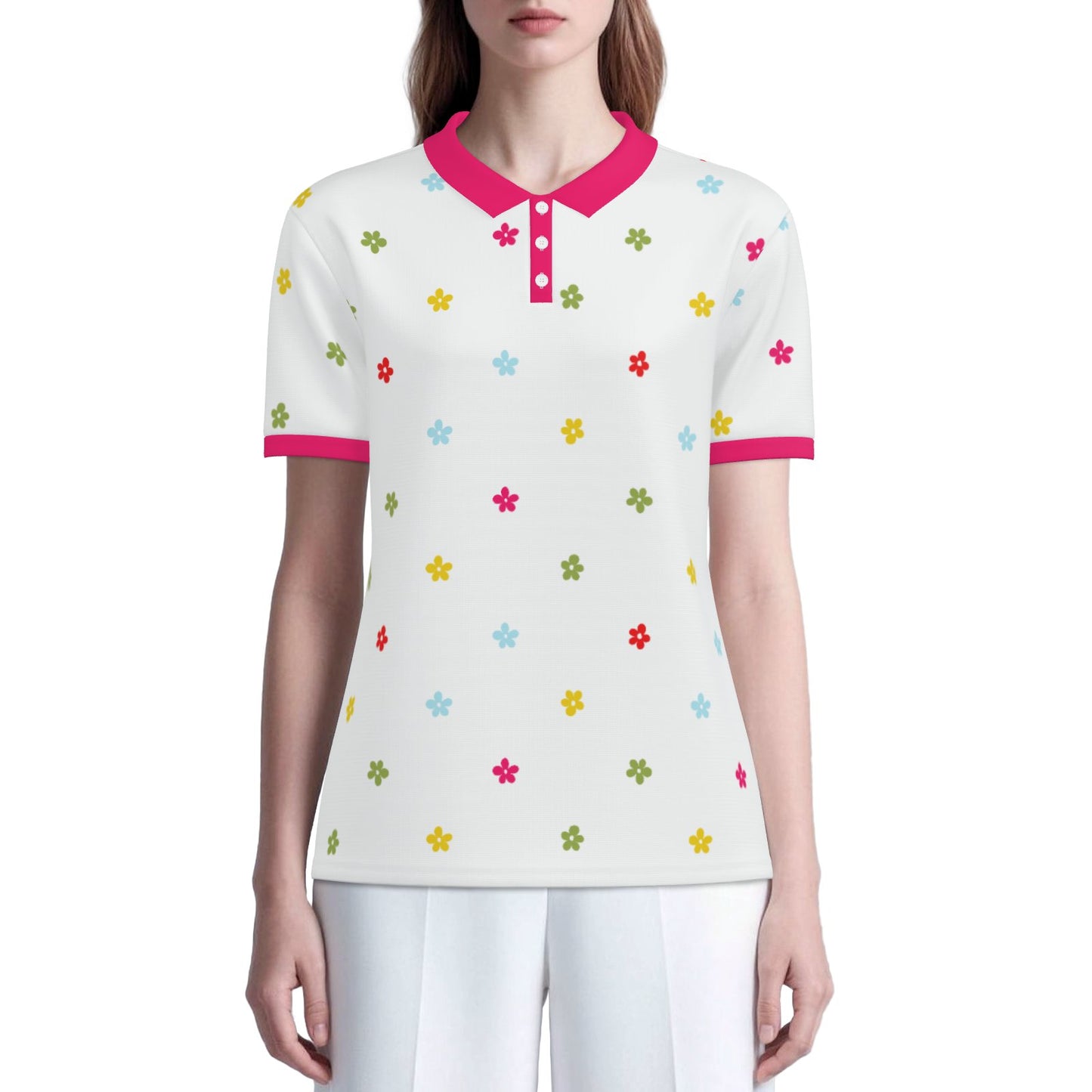 Mod 60s floral polo shirt with UPF 50+ sun protection. Unisex vintage-inspired polo featuring a white background, colorful floral print, and fuchsia pink trim.