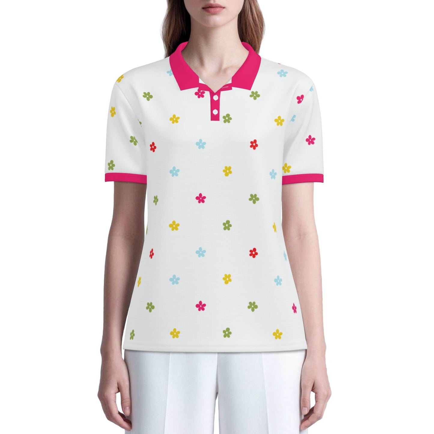 Mod 60s floral polo shirt with UPF 50+ sun protection. Unisex vintage-inspired polo featuring a white background, colorful floral print, and fuchsia pink trim.