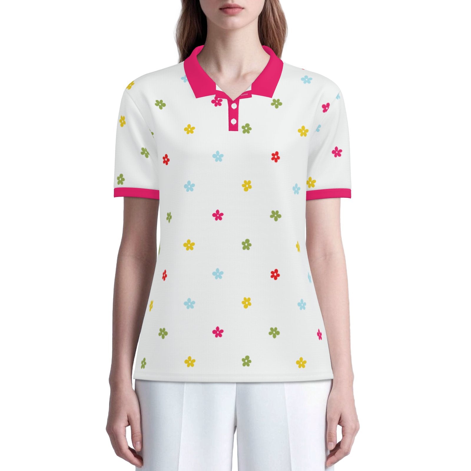 Mod 60s floral polo shirt with UPF 50+ sun protection. Unisex vintage-inspired polo featuring a white background, colorful floral print, and fuchsia pink trim.