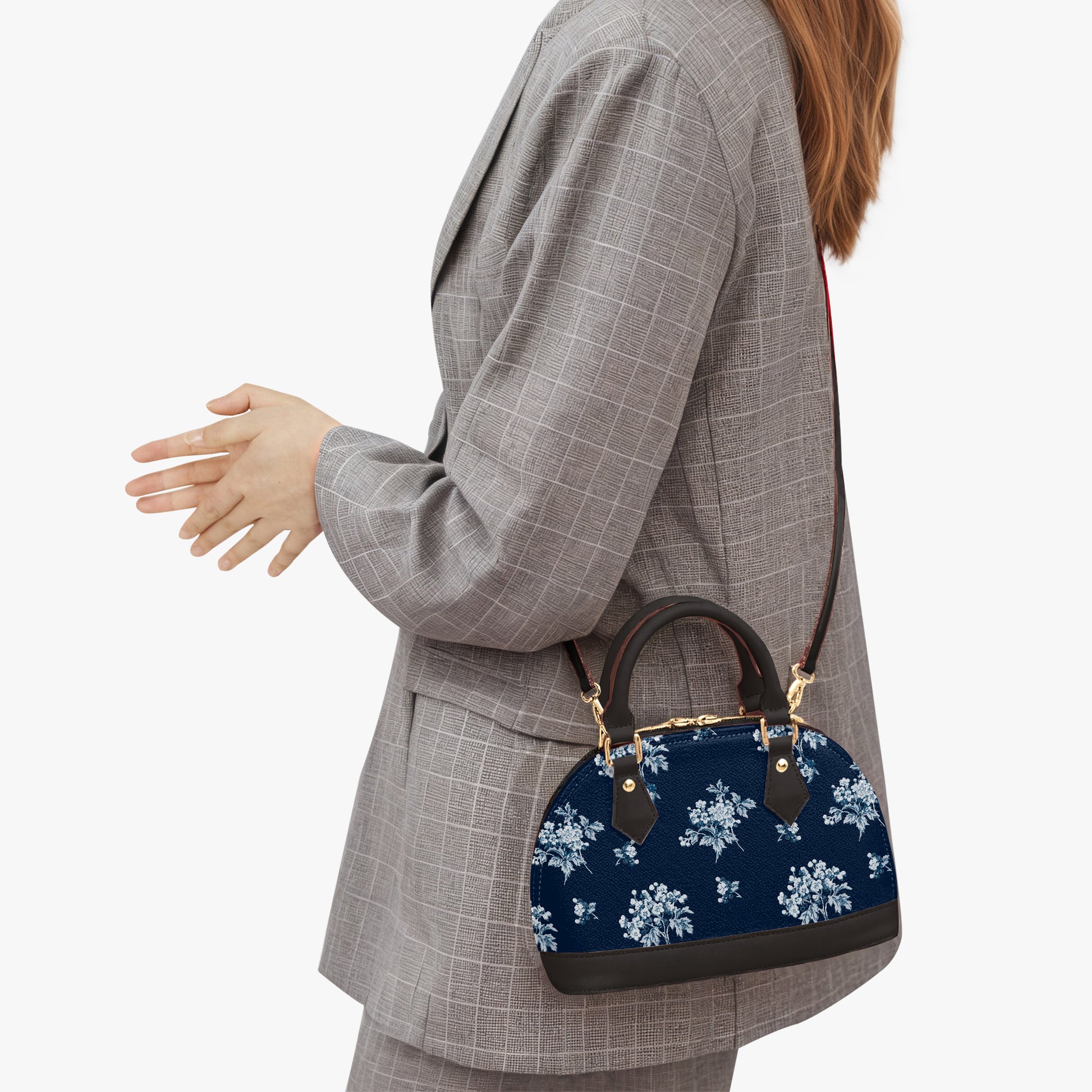 Romantic navy blue floral half moon handbag with delicate vintage-inspired floral print. Small crossbody purse with black or beige handles for casual or formal wear.